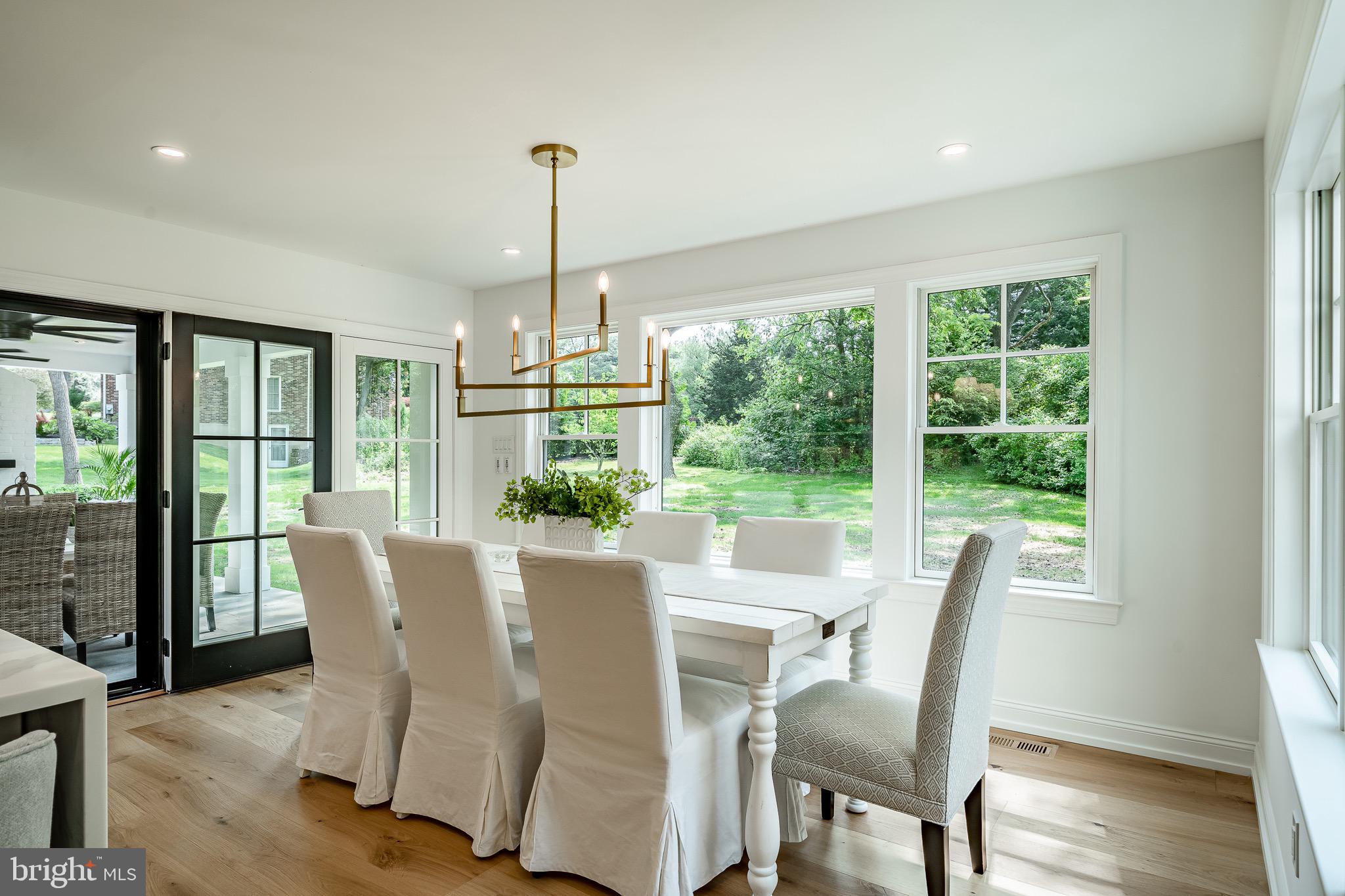 2058 Waterloo Road Berwyn, PA 19312 - Photo 10 of 46 a view of a dining room with furniture window and wooden floor