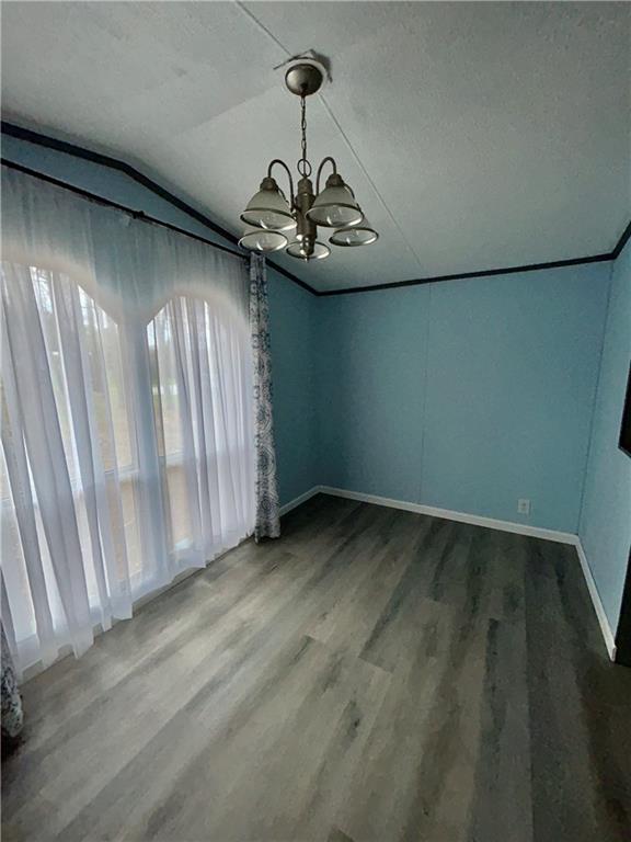507 Reed Lane Butler, PA 16001 - Photo 11 of 21 a view of wooden floor and chandelier in a room