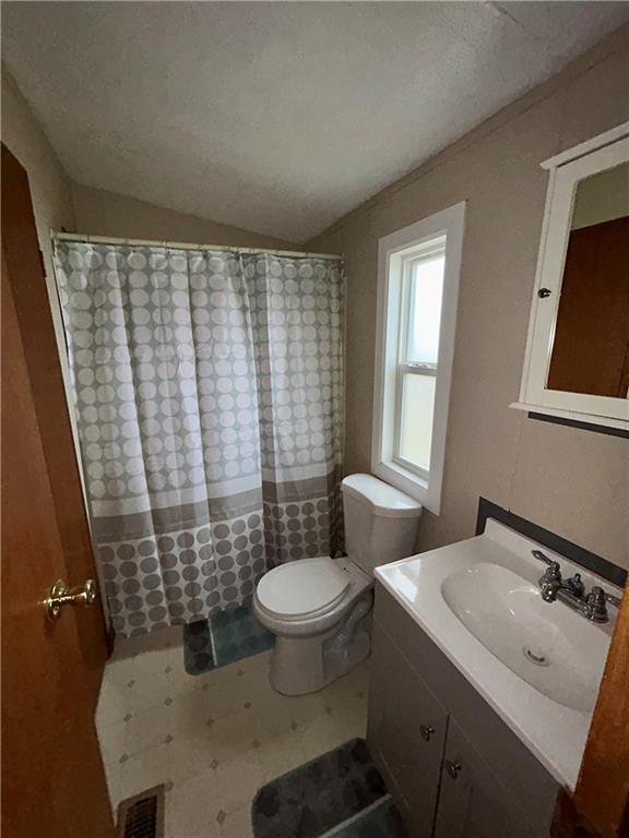 507 Reed Lane Butler, PA 16001 - Photo 19 of 21 a bathroom with a sink toilet and shower