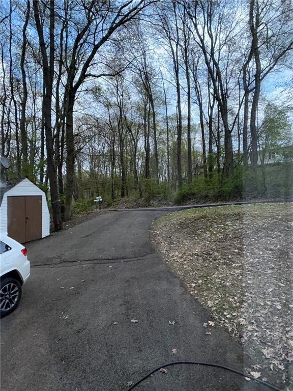 507 Reed Lane Butler, PA 16001 - Photo 21 of 21 a view of a yard with trees