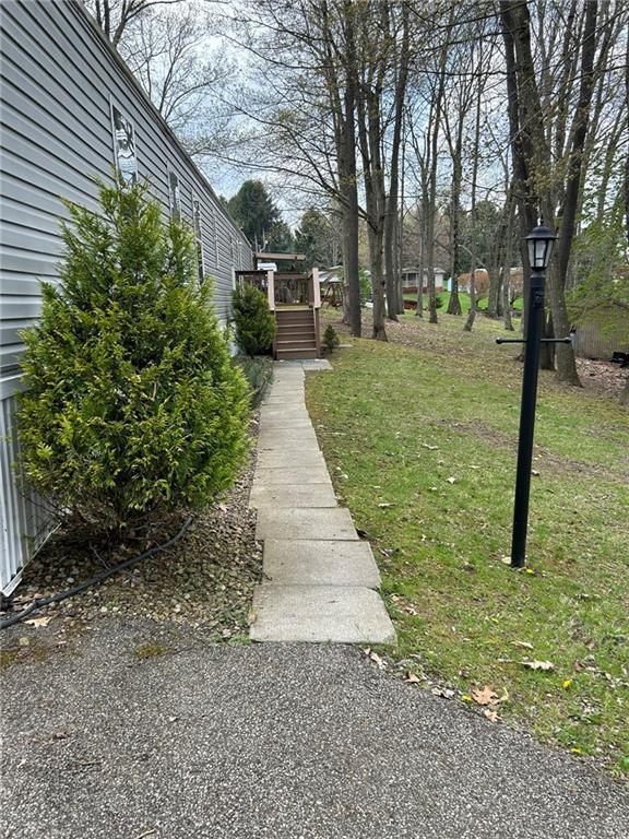 507 Reed Lane Butler, PA 16001 - Photo 3 of 21 a pathway of a yard