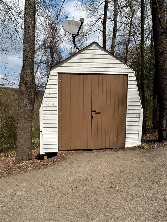 507 Reed Lane Butler, PA 16001 - Photo 6 of 21 a view of a house with a backyard