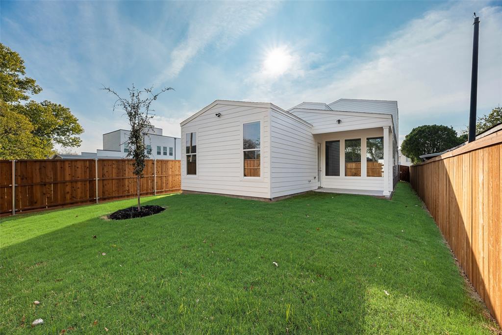 1967 Leath Street Dallas, TX 75212 - Photo 5 of 5 a view of a backyard with plants and large tree