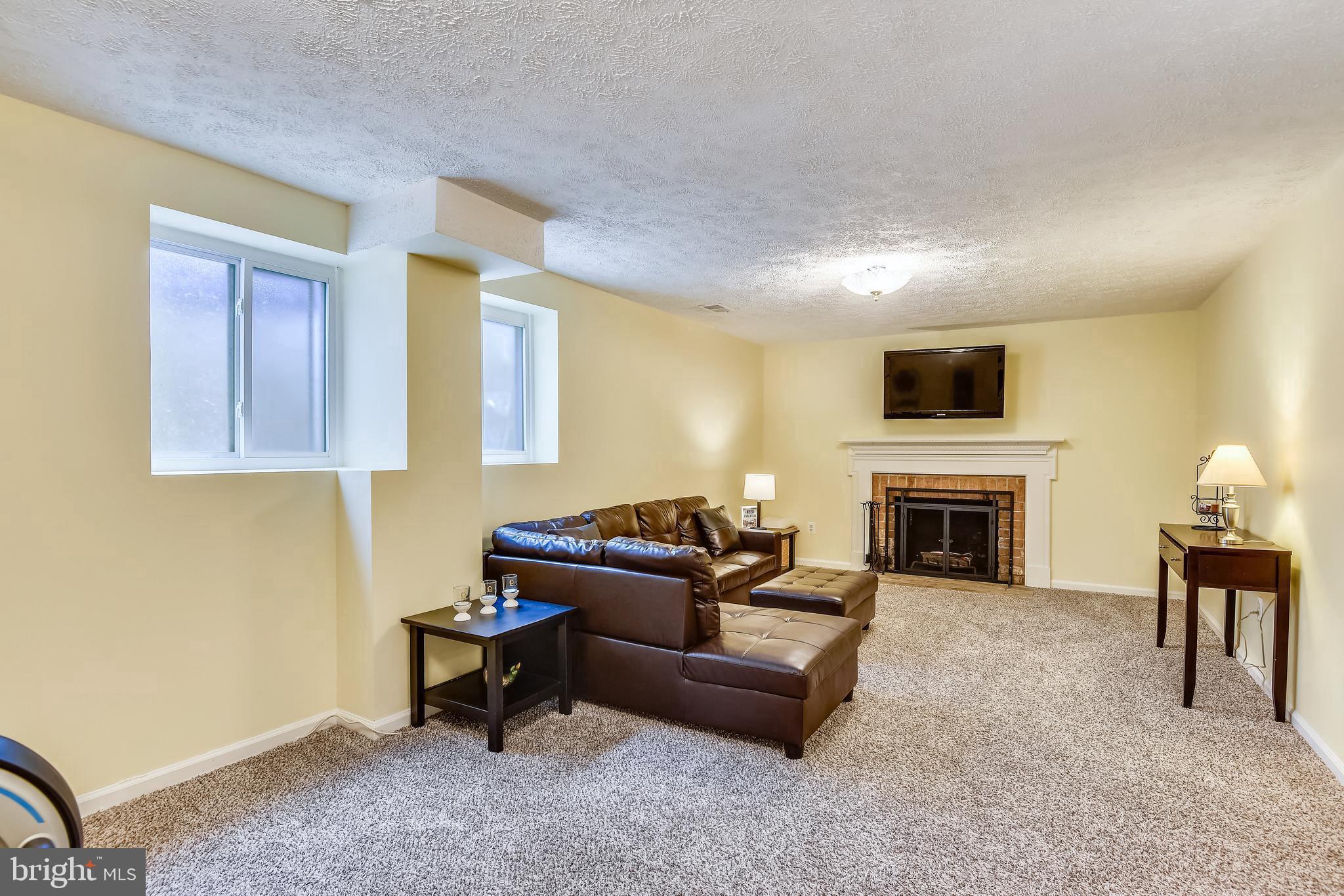 8523 Forrester Boulevard Springfield, VA 22152 - Photo 25 of 36 Cozy wood burning fireplace!