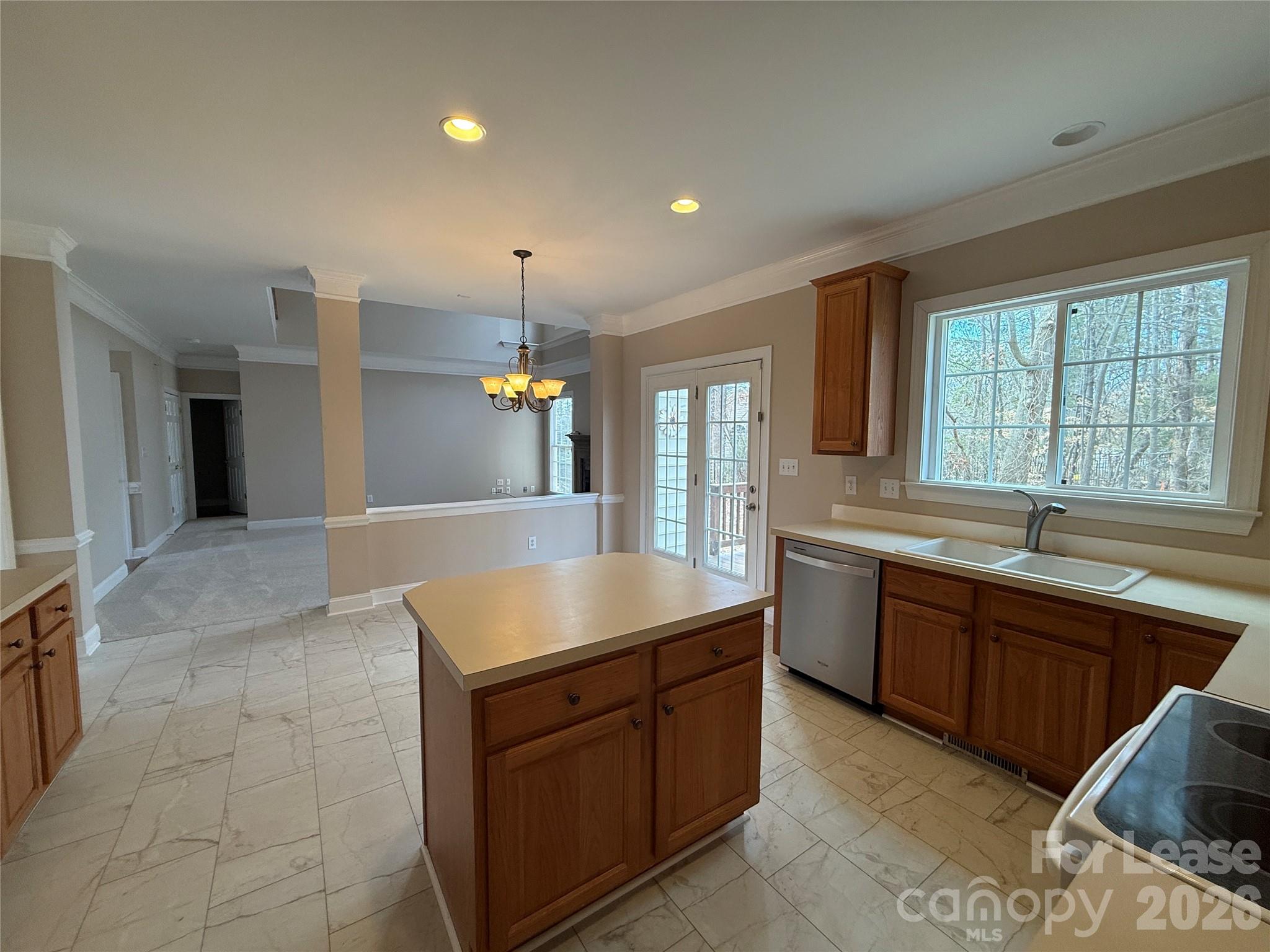 3993 Lake Shore Road South Denver, NC 28037 - Photo 15 of 39 a kitchen with a sink stove and granite counter top