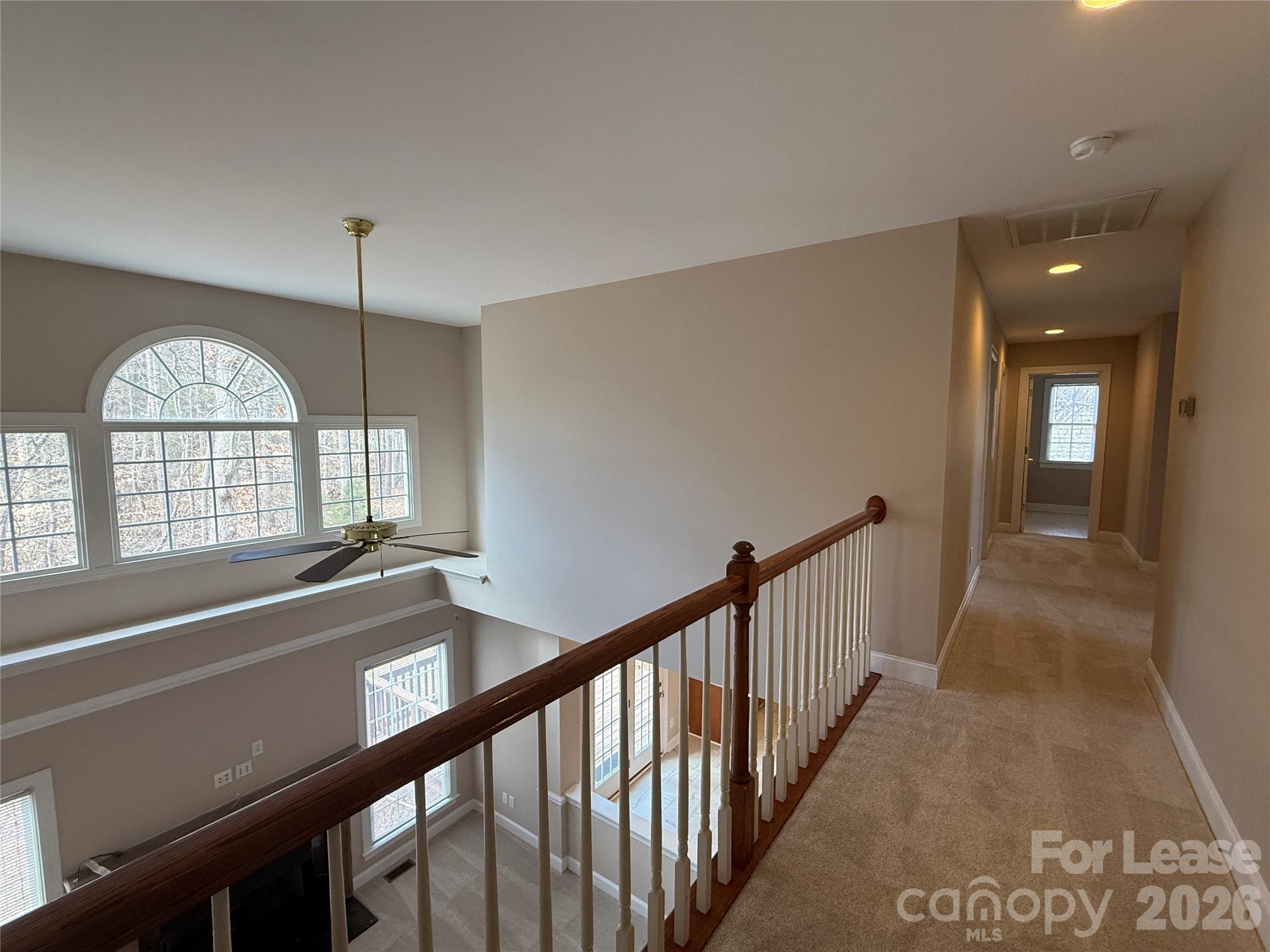 3993 Lake Shore Road South Denver, NC 28037 - Photo 22 of 39 a view of hall with wooden floor and windows