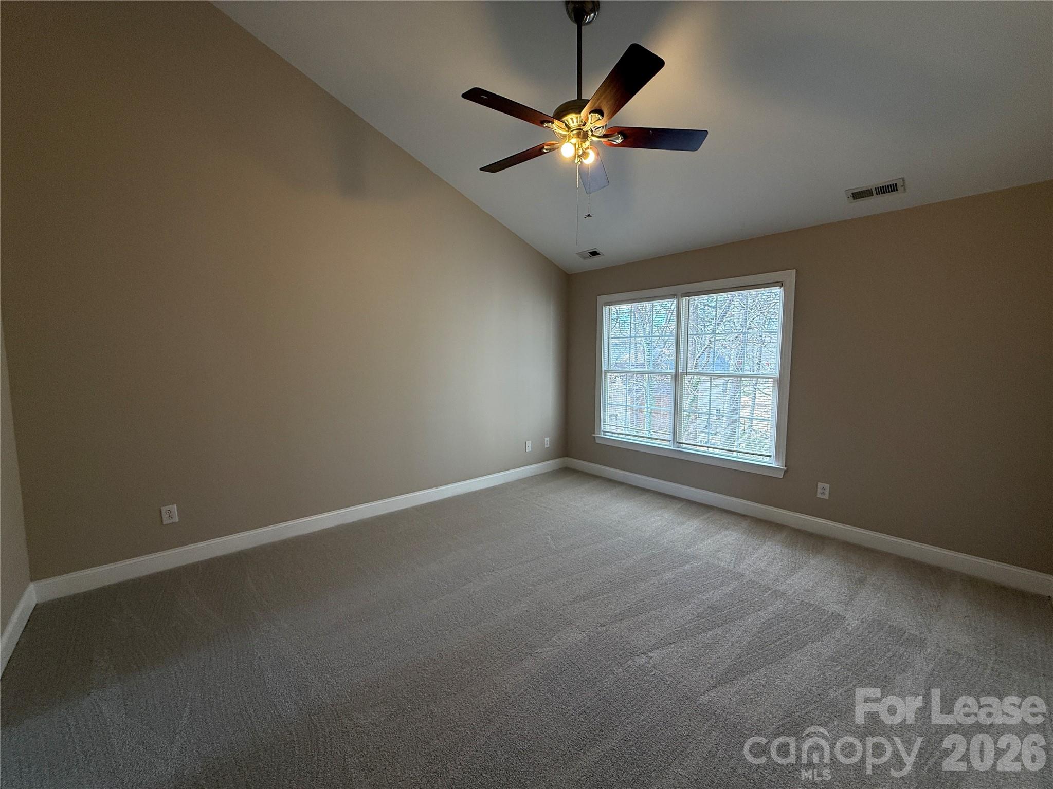 3993 Lake Shore Road South Denver, NC 28037 - Photo 24 of 39 wooden floor in an empty room with a window