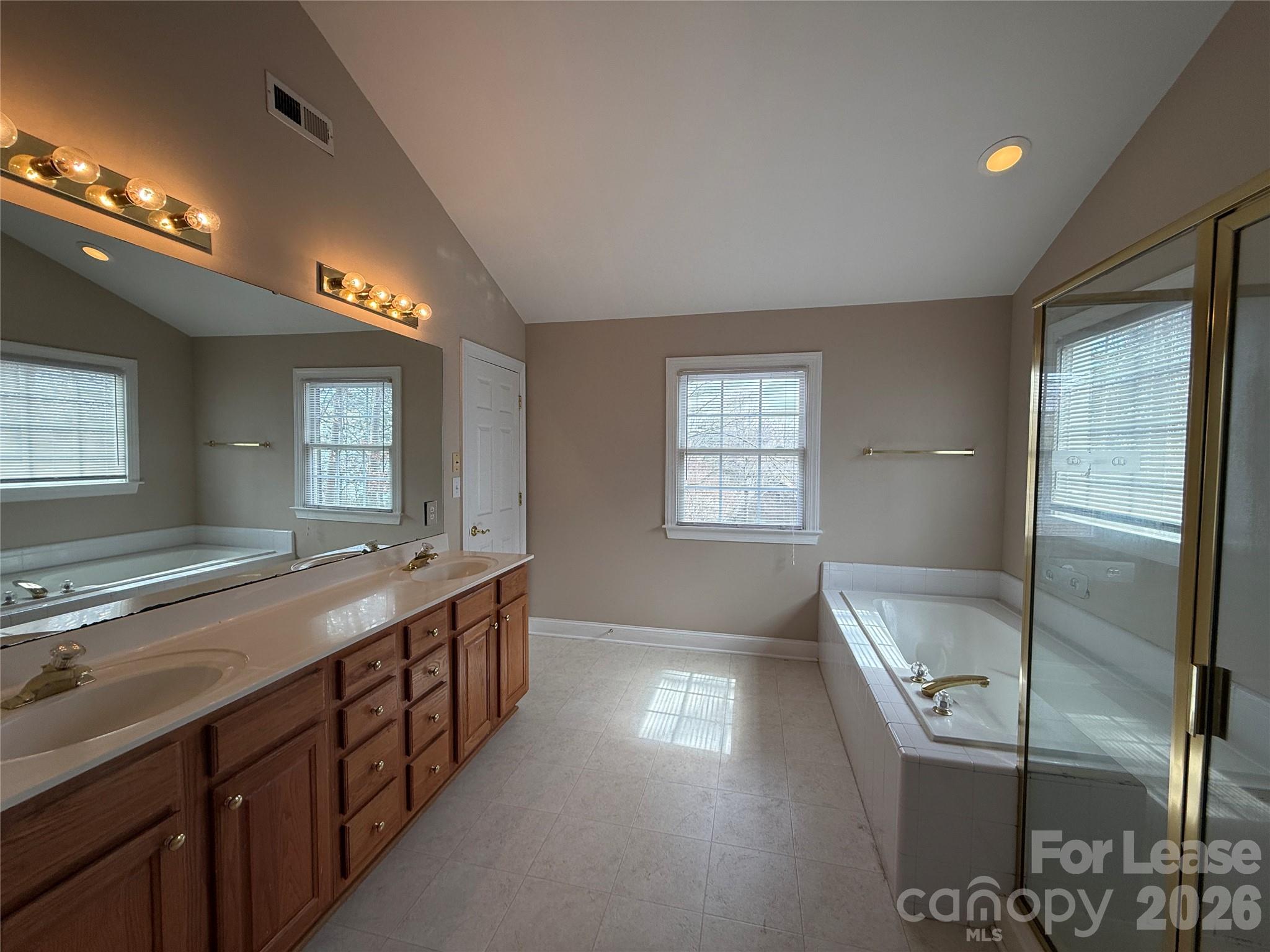 3993 Lake Shore Road South Denver, NC 28037 - Photo 26 of 39 a bathroom with mirror and a sink
