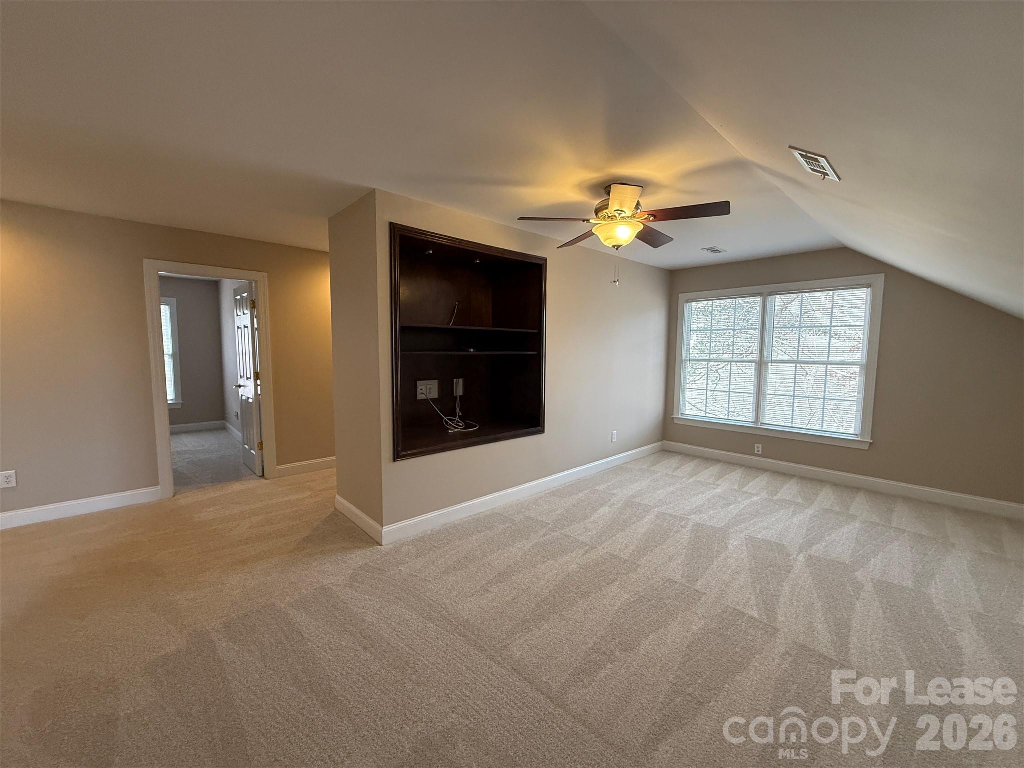 3993 Lake Shore Road South Denver, NC 28037 - Photo 29 of 39 a view of an empty room with a window