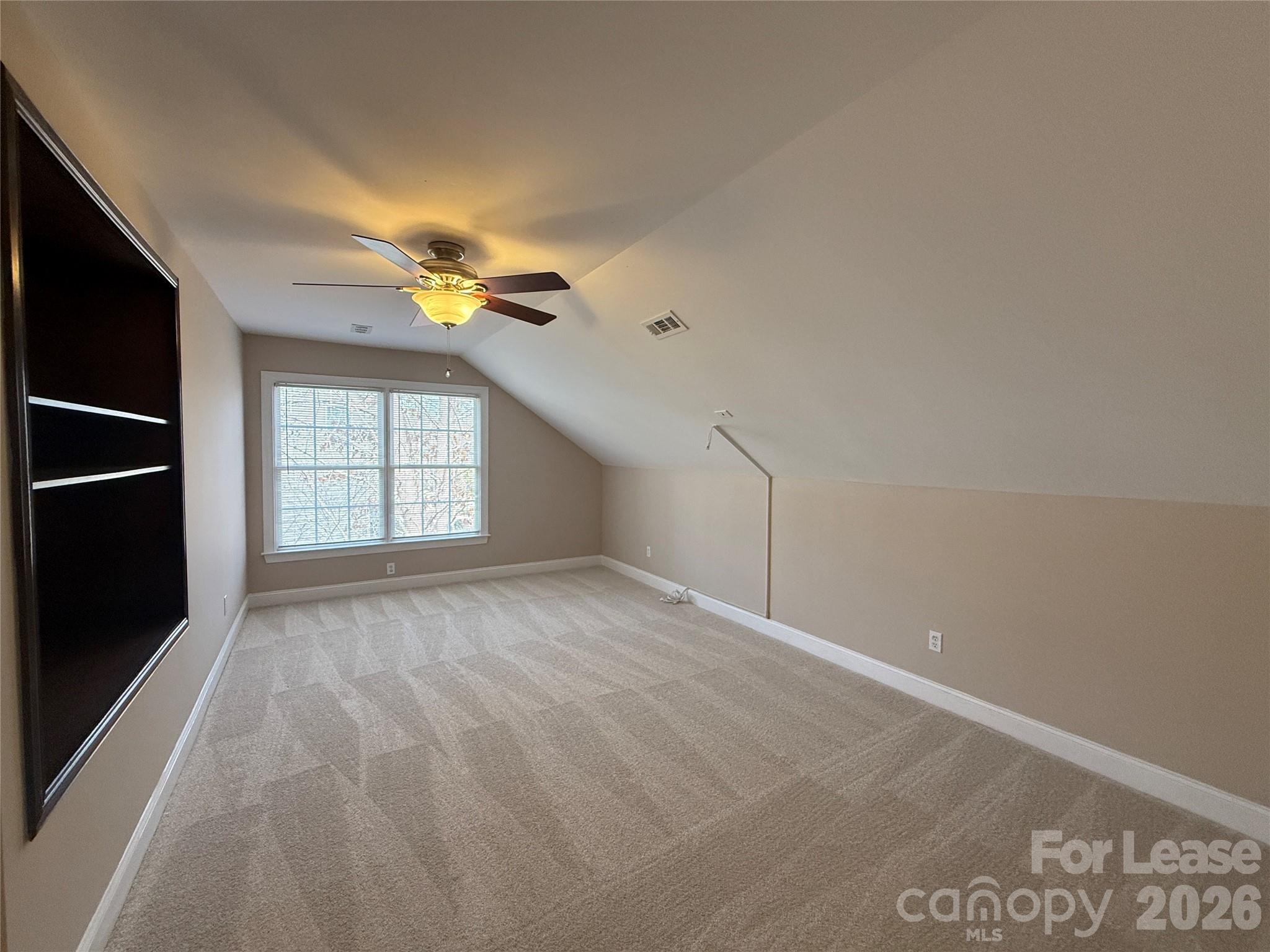 3993 Lake Shore Road South Denver, NC 28037 - Photo 30 of 39 a view of an empty room with a window