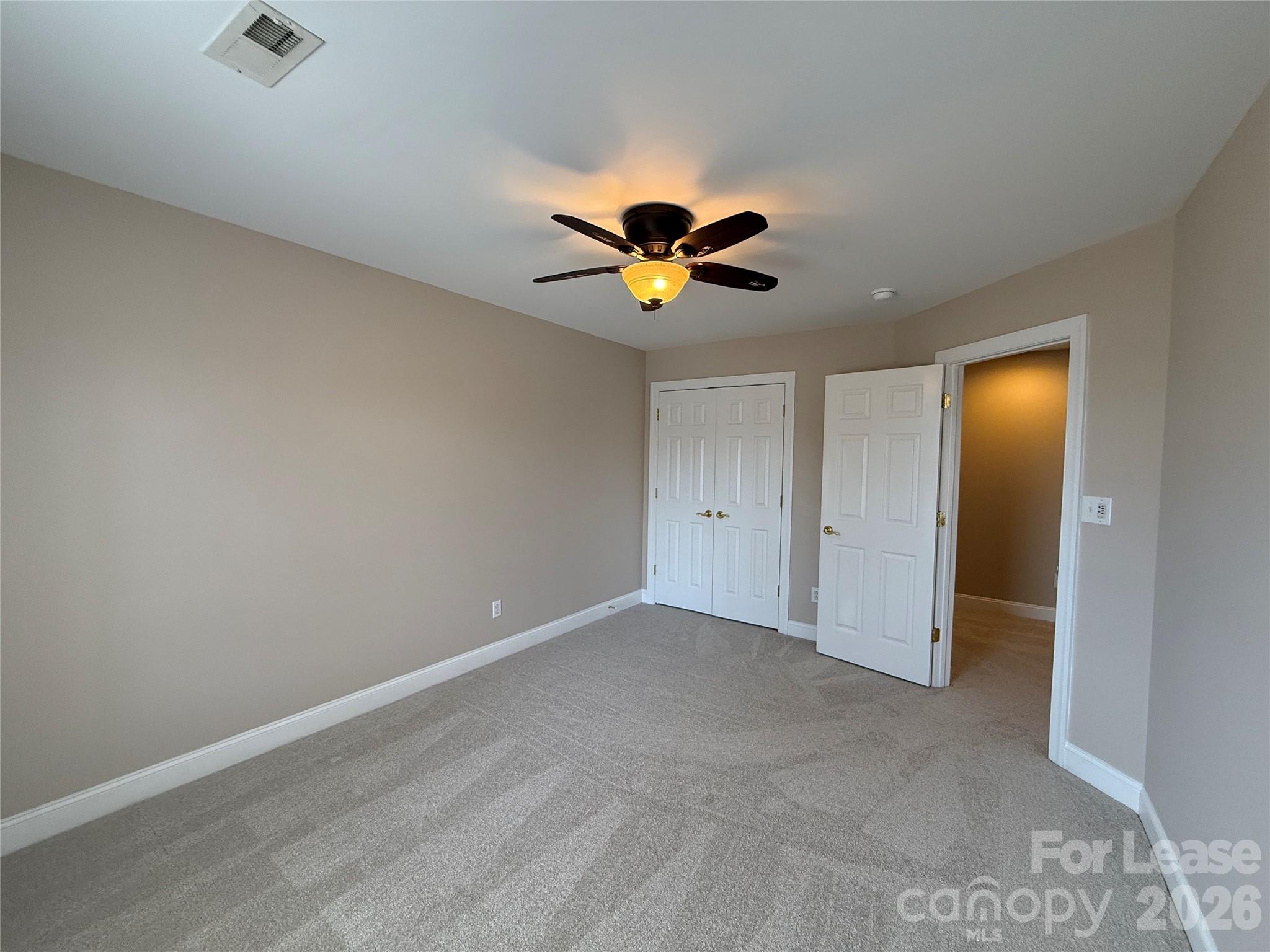 3993 Lake Shore Road South Denver, NC 28037 - Photo 31 of 39 wooden floor in an empty room with a window