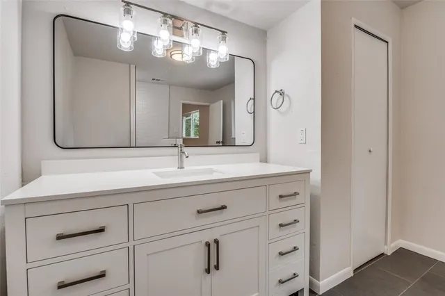 a bathroom with a shower and toilet