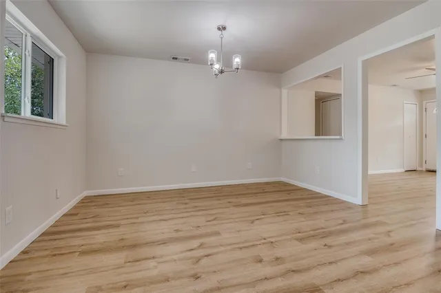 a view of a kitchen with a sink and cabinet cabinets
