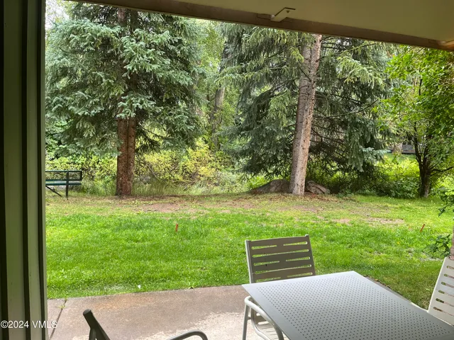 a view of outdoor space and yard