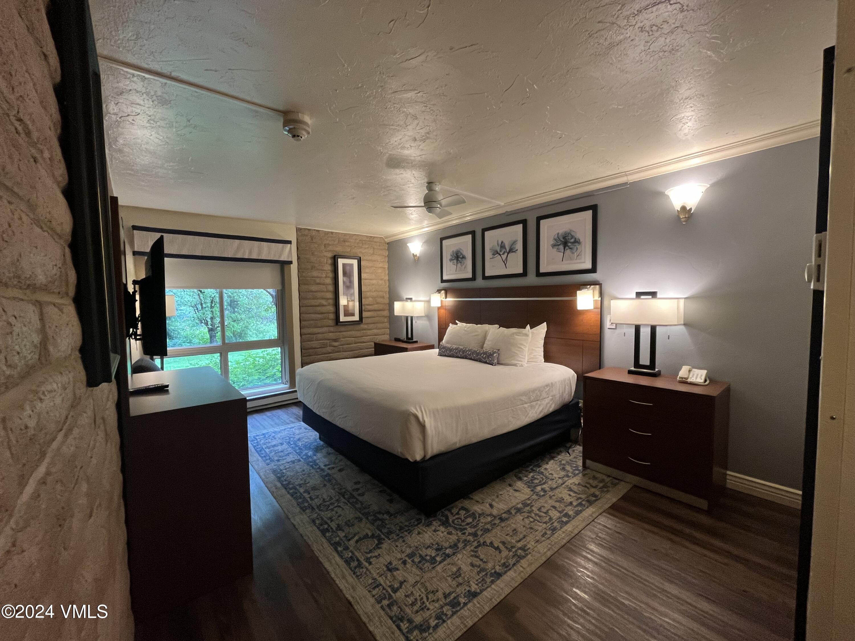 1020 Vail View Drive, Unit 311247 Vail, CO 81657 - Photo 5 of 23 a bedroom with a bed and window