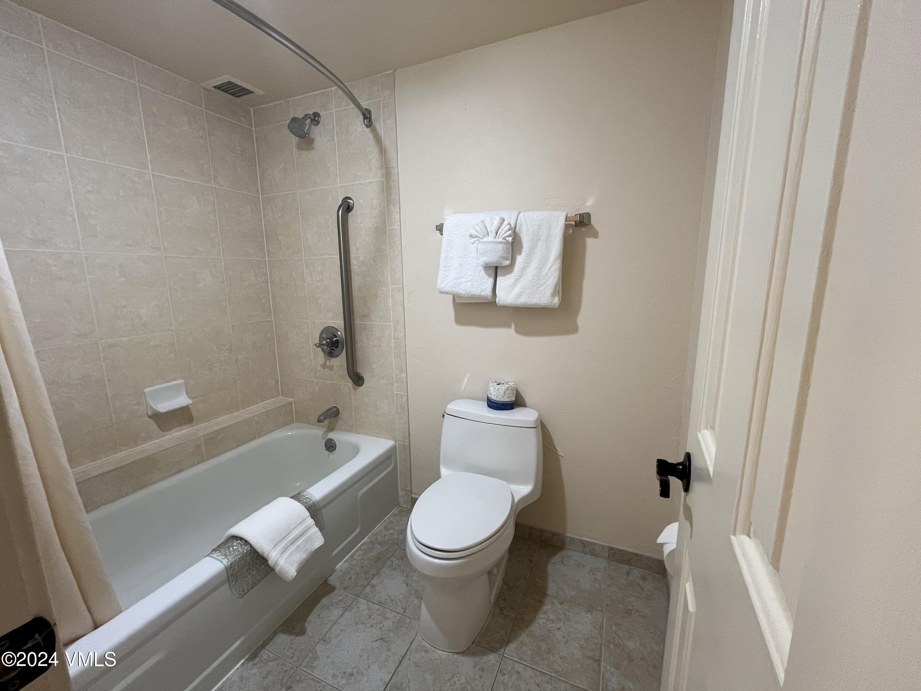 1020 Vail View Drive, Unit 311247 Vail, CO 81657 - Photo 8 of 23 a bathroom with a toilet and a shower