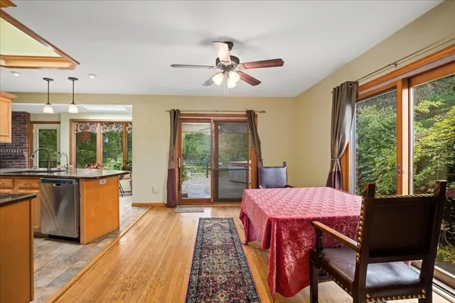 a view of a dining room with furniture window and outside view