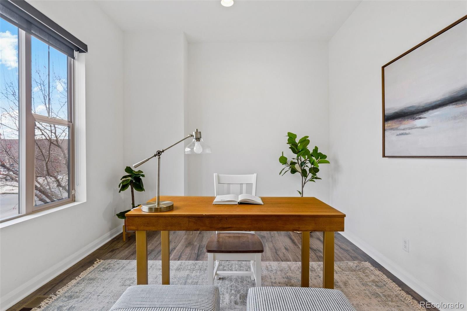 6731 Raritan Drive Denver, CO 80221 - Photo 11 of 40 a view of a workspace with furniture