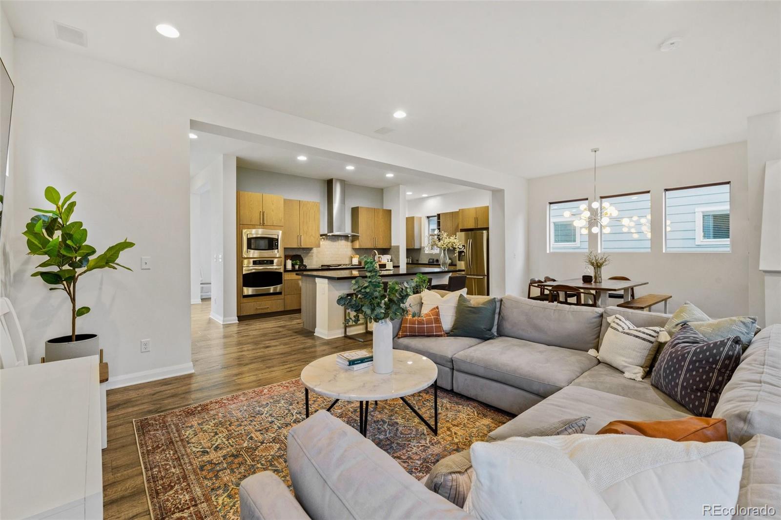 6731 Raritan Drive Denver, CO 80221 - Photo 18 of 40 a living room with furniture kitchen view and a window