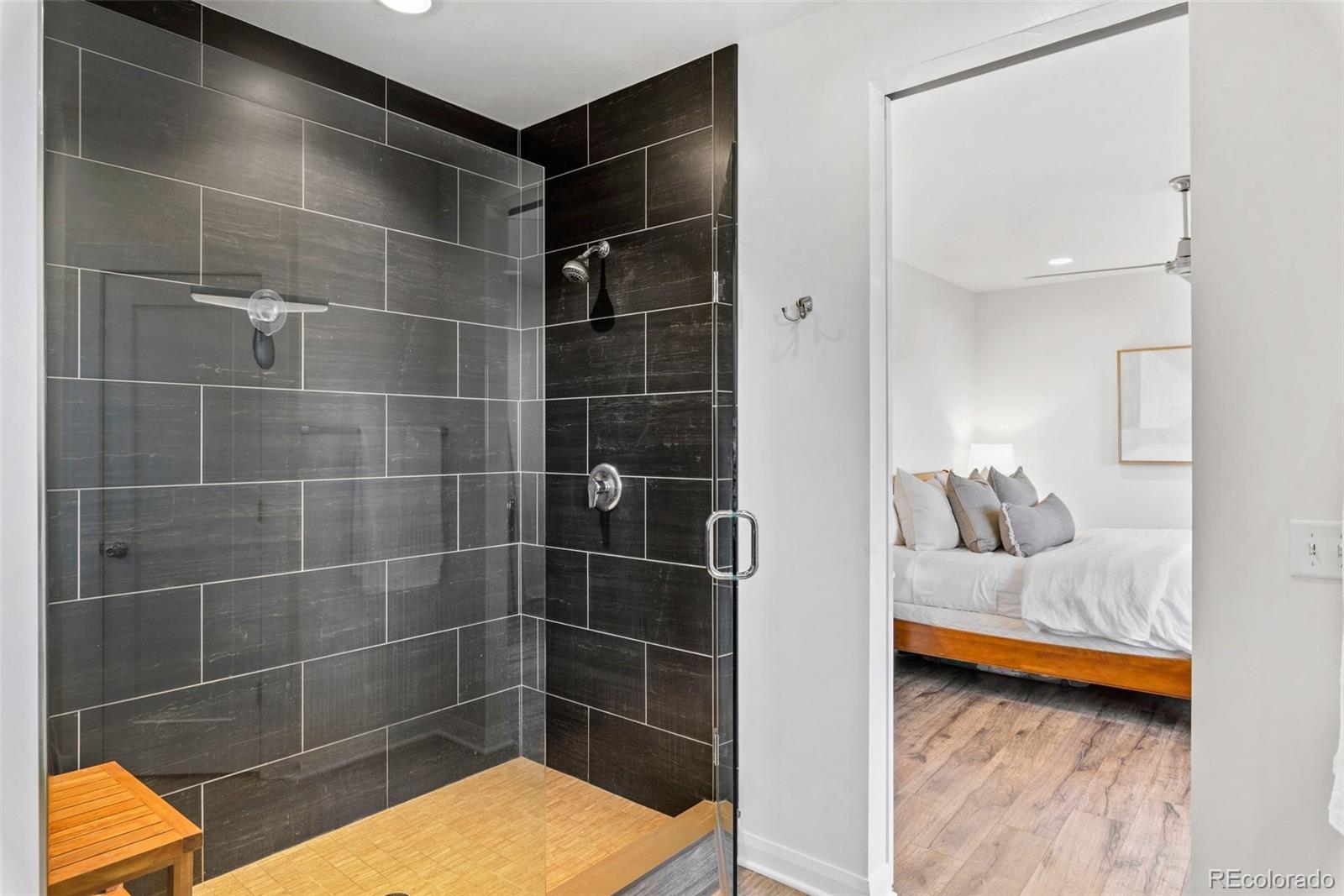 6731 Raritan Drive Denver, CO 80221 - Photo 25 of 40 a bathroom with a tub and shower