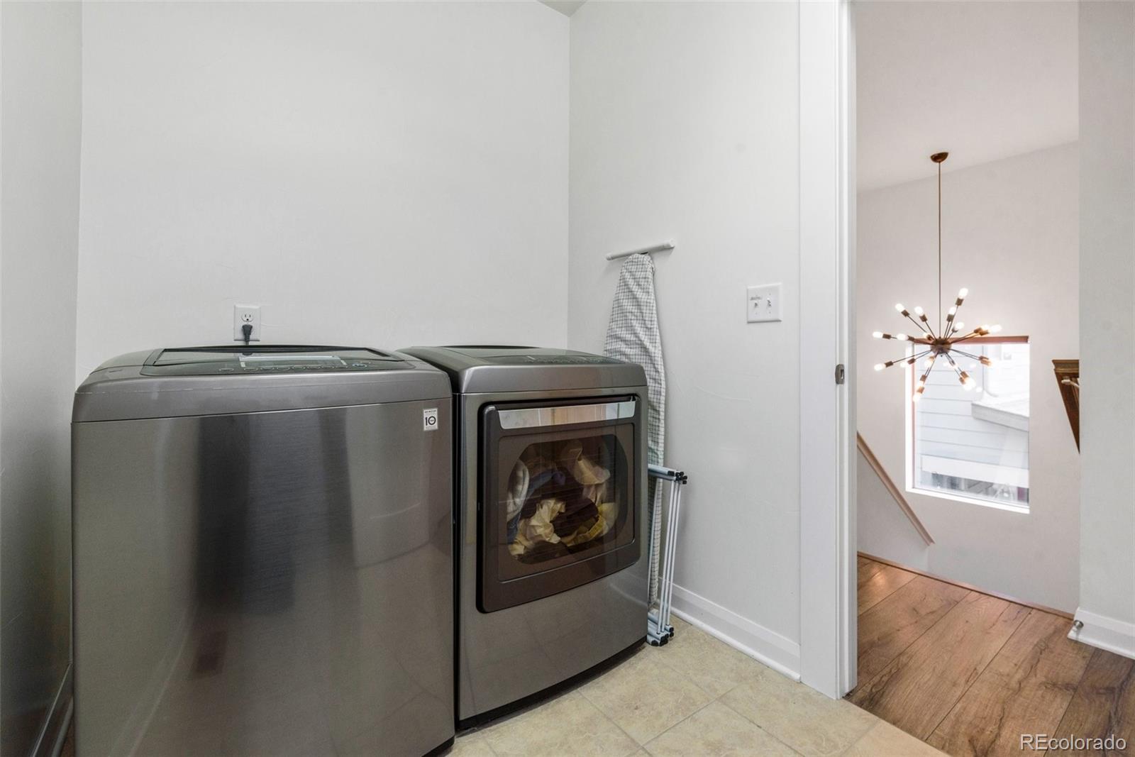 6731 Raritan Drive Denver, CO 80221 - Photo 33 of 40 a utility room with dryer and washer