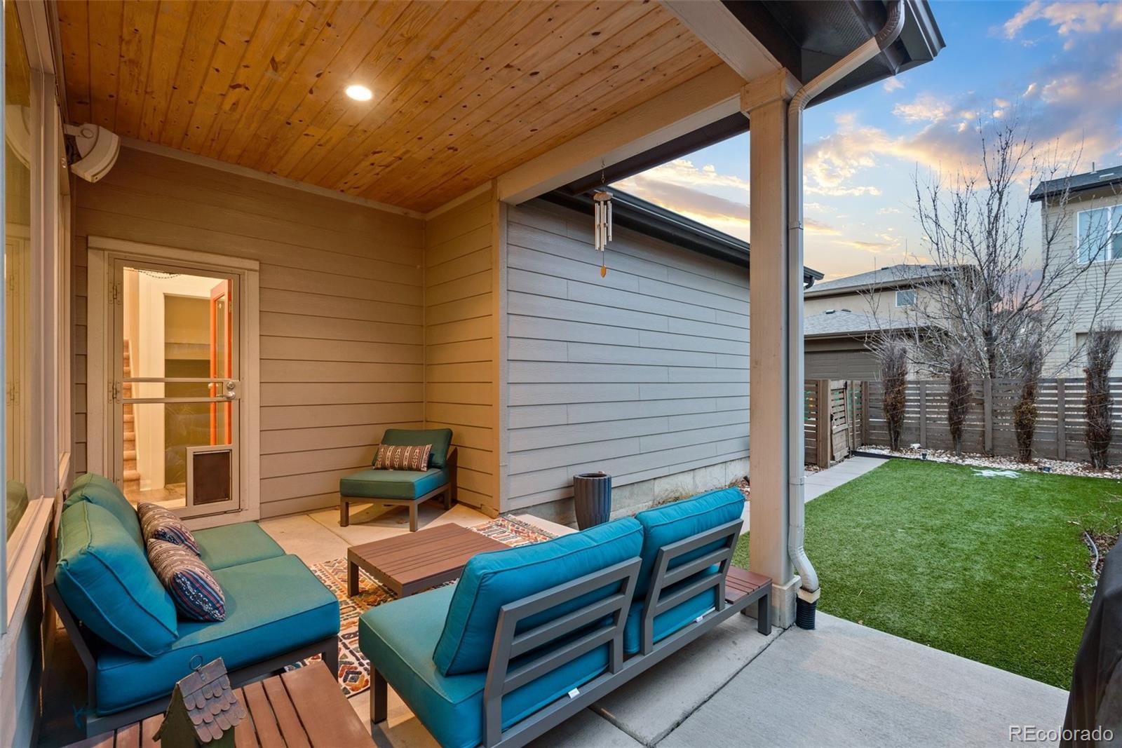 6731 Raritan Drive Denver, CO 80221 - Photo 36 of 40 a backyard of a house with seating space
