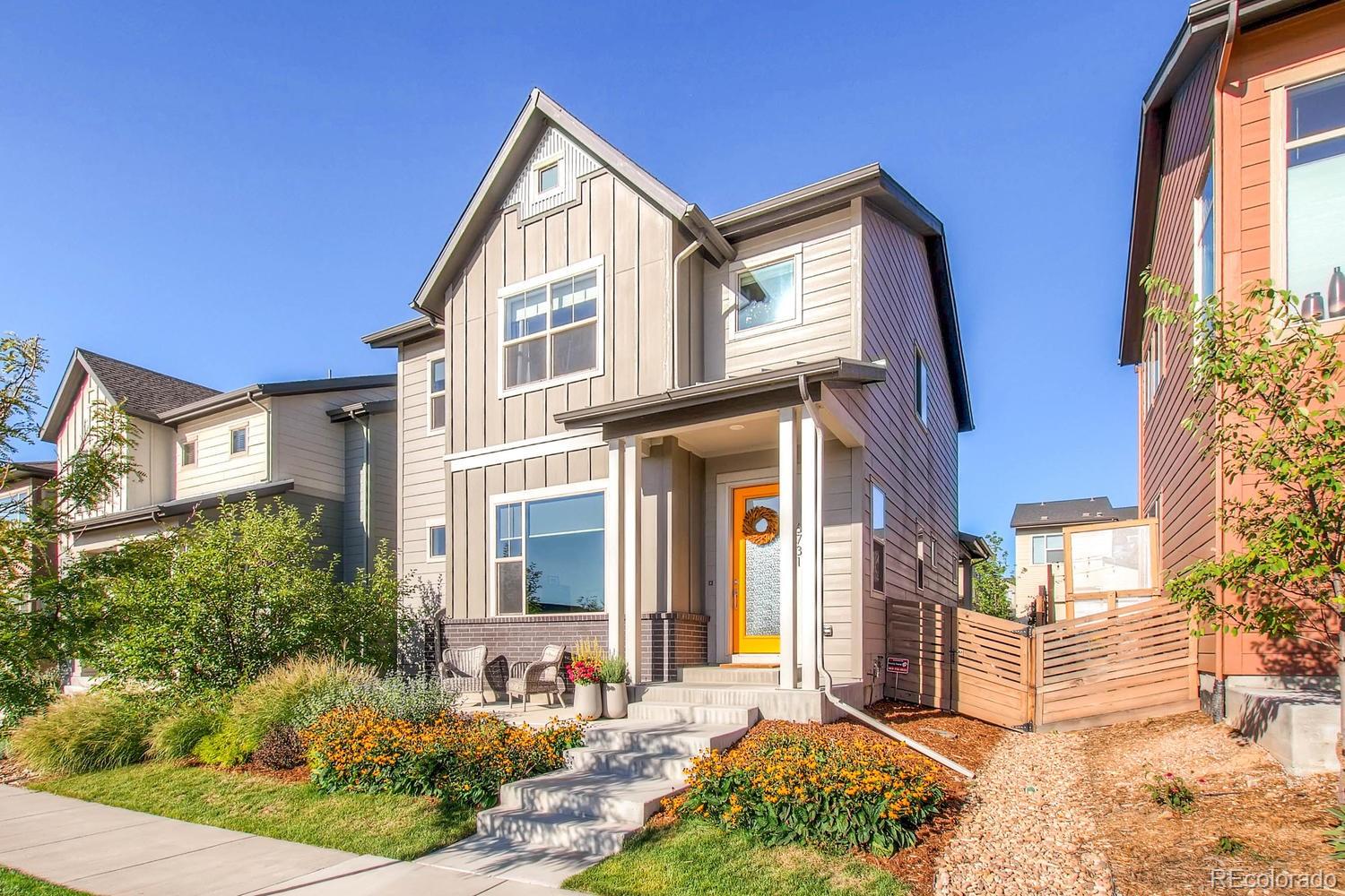 6731 Raritan Drive Denver, CO 80221 - Photo 38 of 40 a front view of a house with a yard