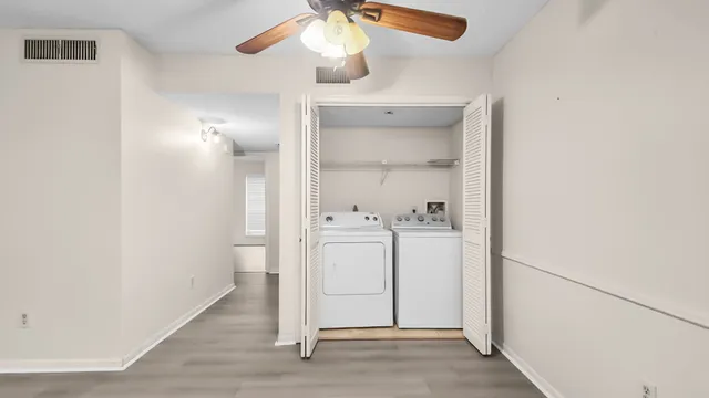 a kitchen with granite countertop a sink and a stove