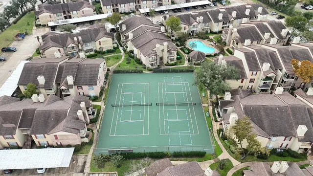 an aerial view of a city with lots of residential buildings