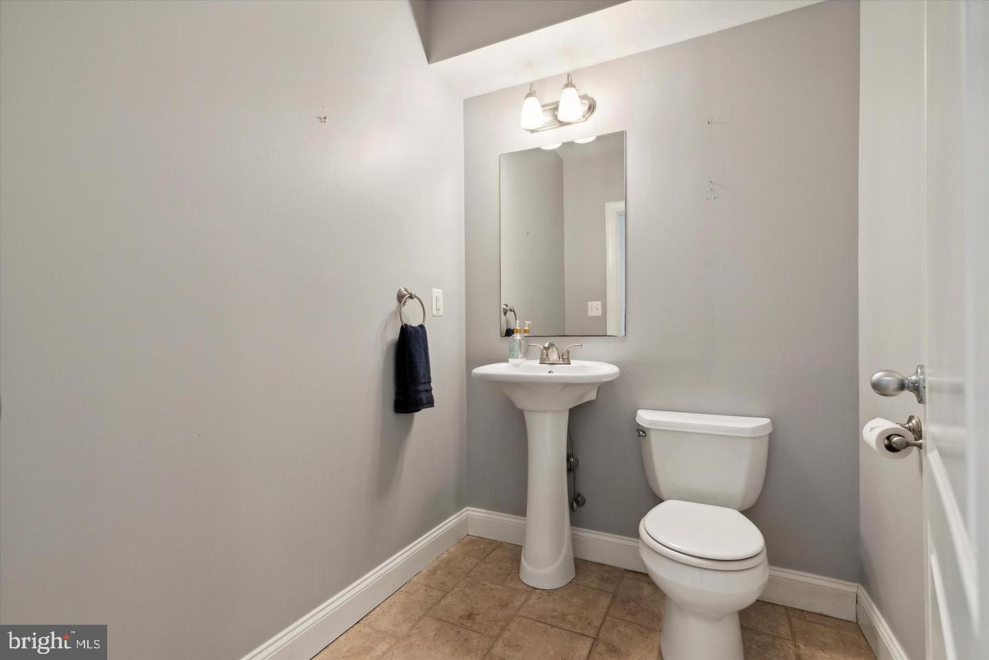 116 Dawson Street Philadelphia, PA 19127 - Photo 7 of 14 Sleek and modern half-bath retreat.