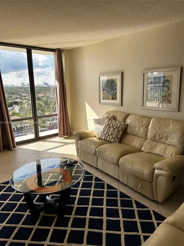 a living room with a large window