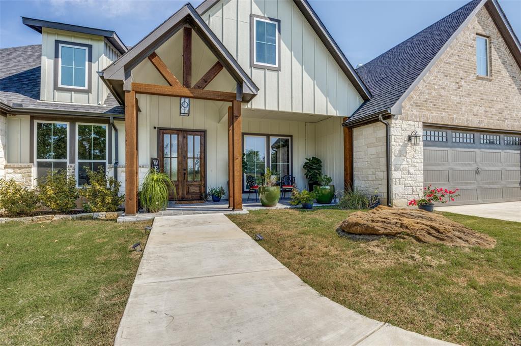 9425 Dripping Springs Road Denison, TX 75021 - Photo 2 of 39 a house view with a outdoor space