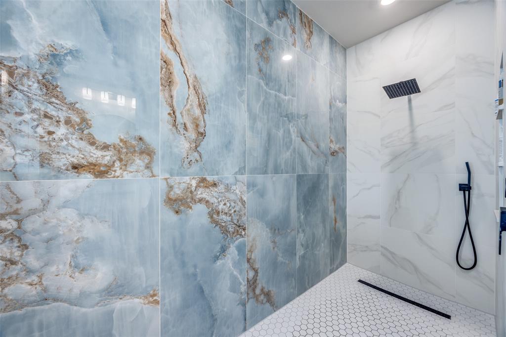 9425 Dripping Springs Road Denison, TX 75021 - Photo 20 of 39 a bathroom with a shower