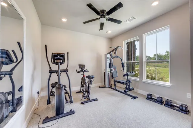 a view of living room with furniture and flat screen tv