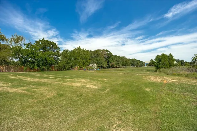 a outdoor living space with furniture and garden view