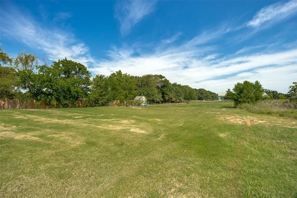 9425 Dripping Springs Road Denison, TX 75021 - Photo 34 of 39 a view of a field with an ocean