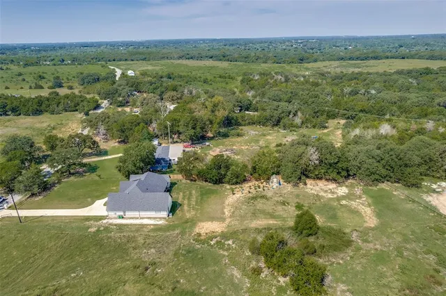 a view of house with garden