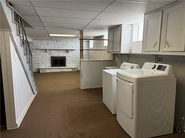 a view of empty room with stairs