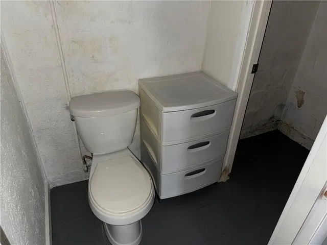 a view of a storage room with stairs