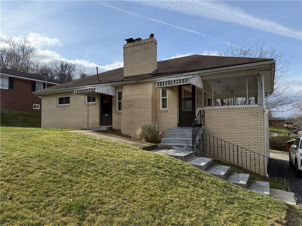 151 Thorne Road Washington, PA 15301 - Photo 20 of 23 a front view of a house with garden