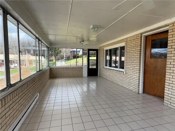 a view of a room with windows