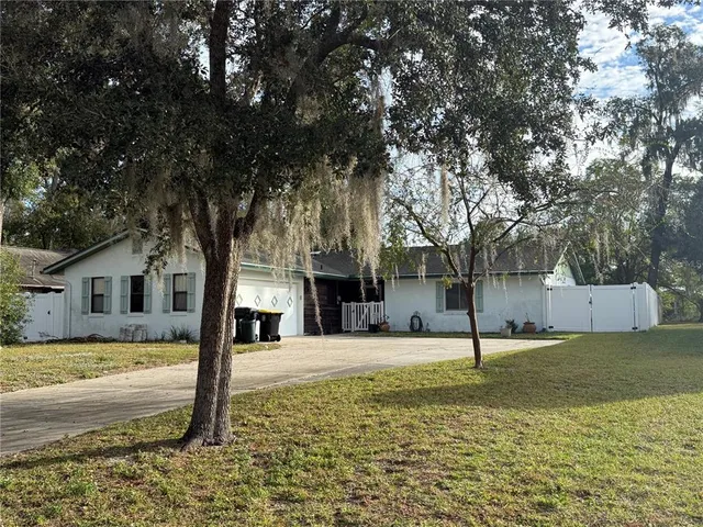 a view of a house with a swimming pool