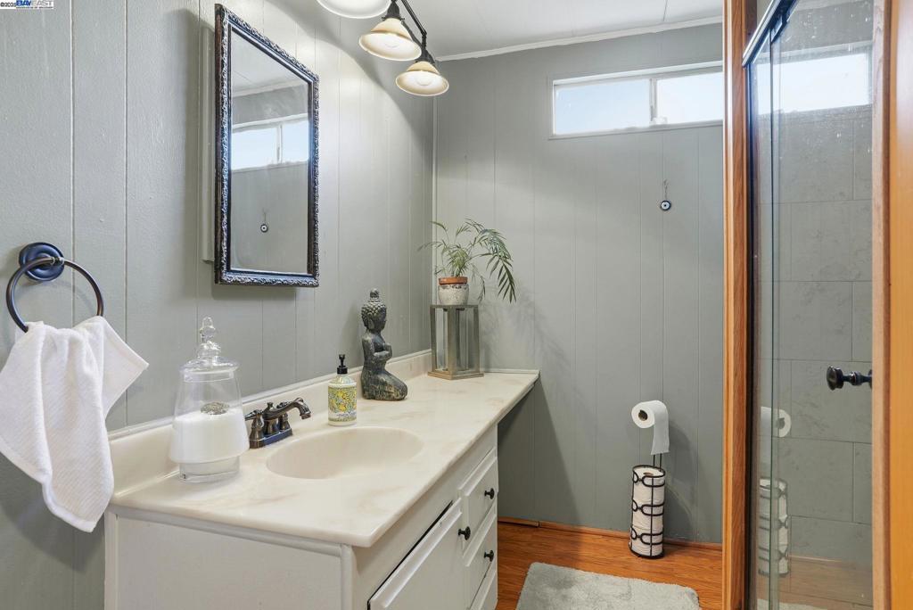 4141 Deep Creek Road Fremont, CA 94555 - Photo 29 of 54 a bathroom with a sink and a mirror