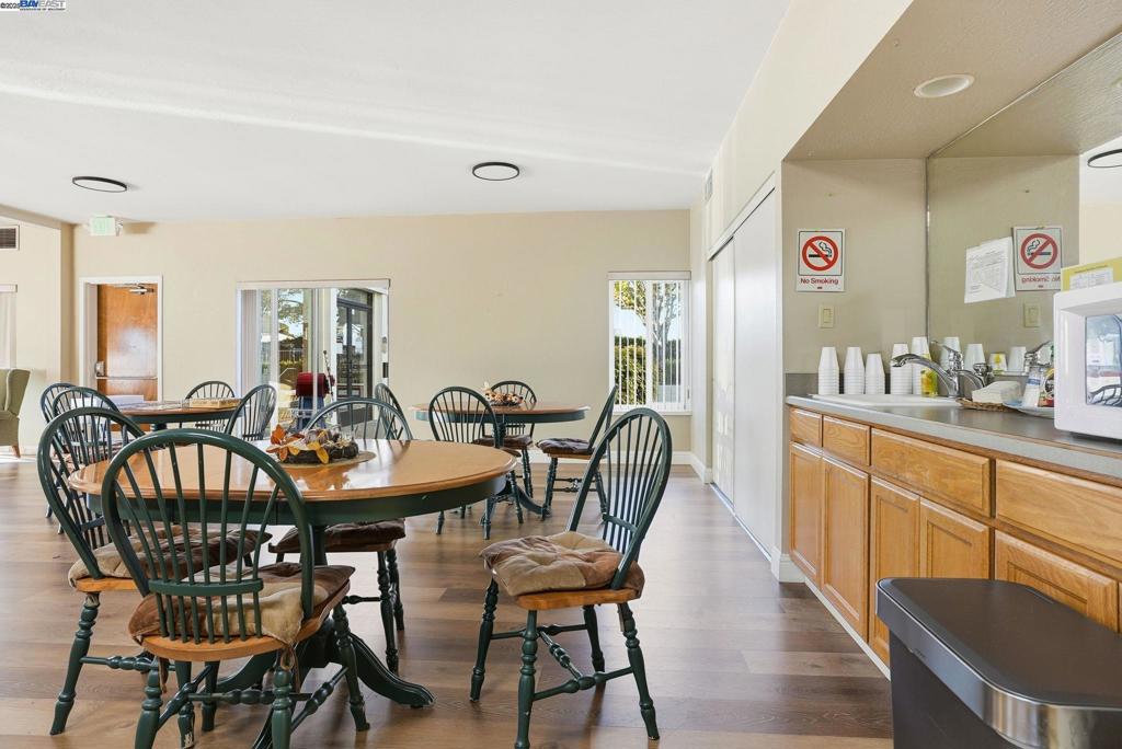 4141 Deep Creek Road Fremont, CA 94555 - Photo 45 of 54 a view of a a dining room with furniture window and wooden floor