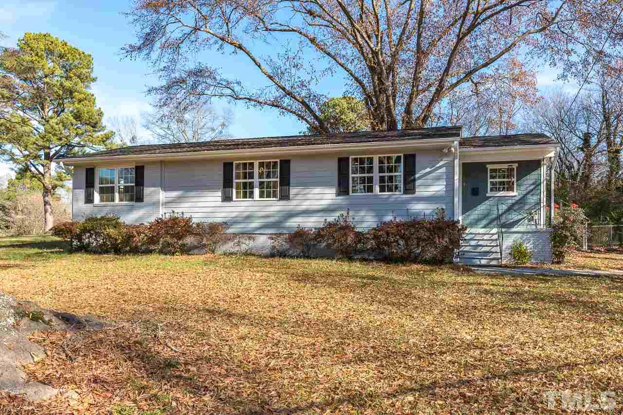2411 Boswell Road Raleigh, NC 27610 - Photo 1 of 26 front view of a house with a yard