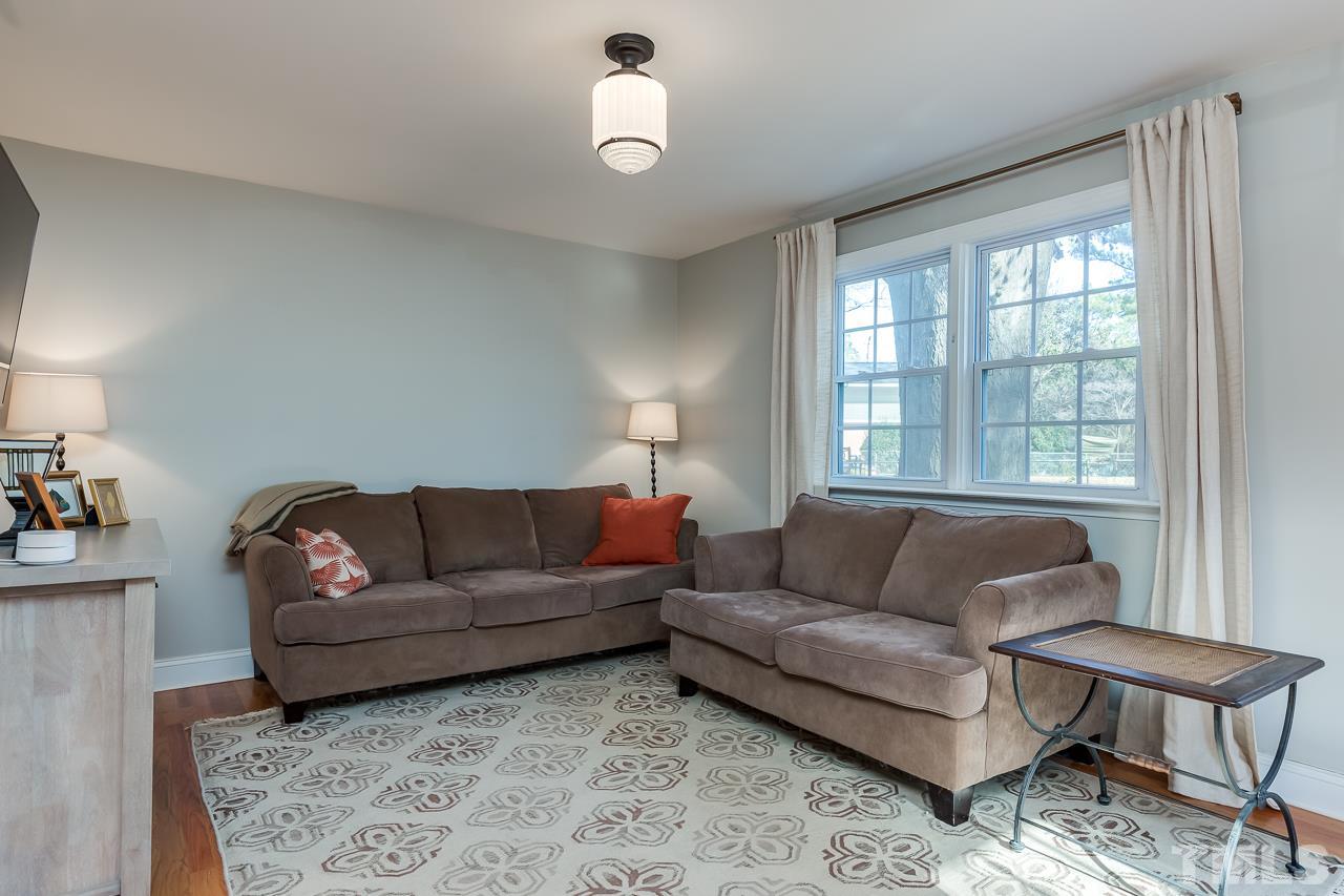 2411 Boswell Road Raleigh, NC 27610 - Photo 13 of 26 a living room with furniture and a large window