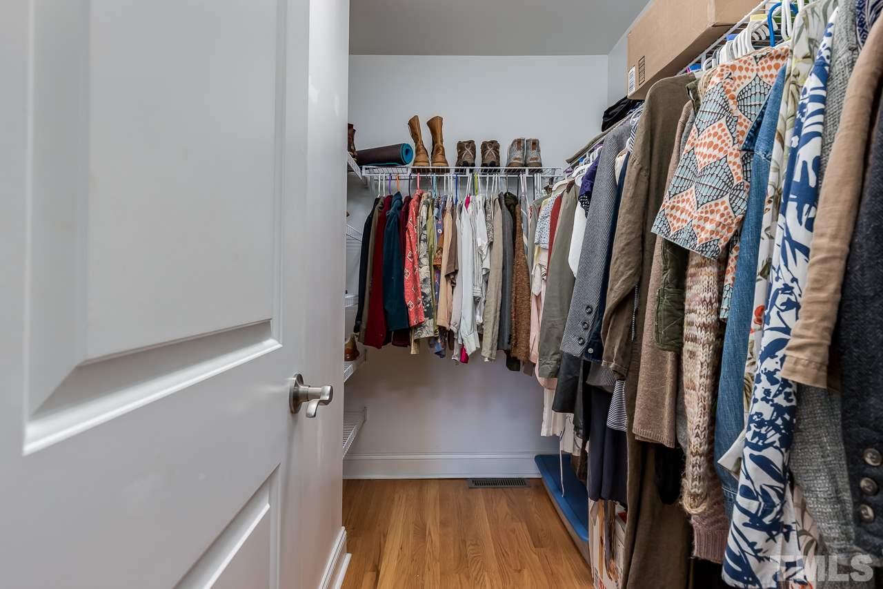 2411 Boswell Road Raleigh, NC 27610 - Photo 18 of 26 a view of walk in closet with clothes