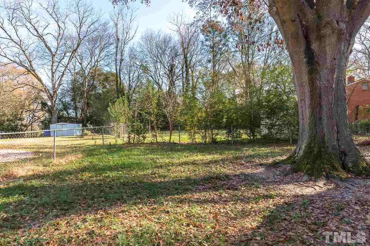 2411 Boswell Road Raleigh, NC 27610 - Photo 26 of 26 a view of a yard with a tree