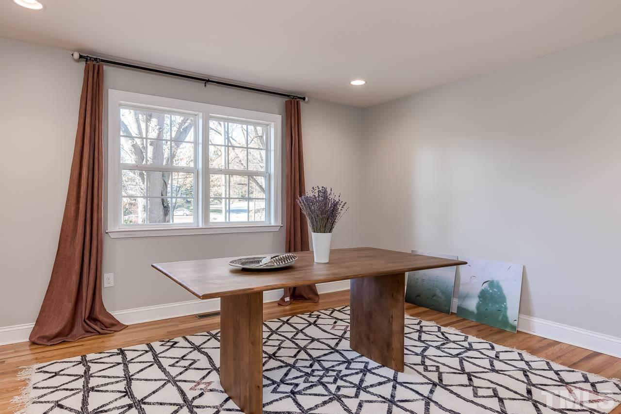 2411 Boswell Road Raleigh, NC 27610 - Photo 6 of 26 a view of a workspace with furniture