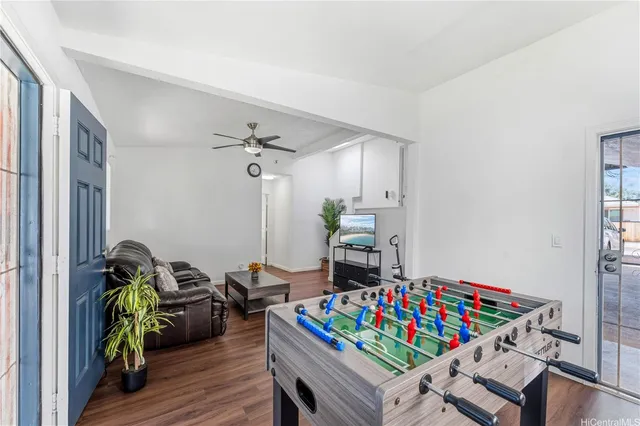 a living room with furniture and a table